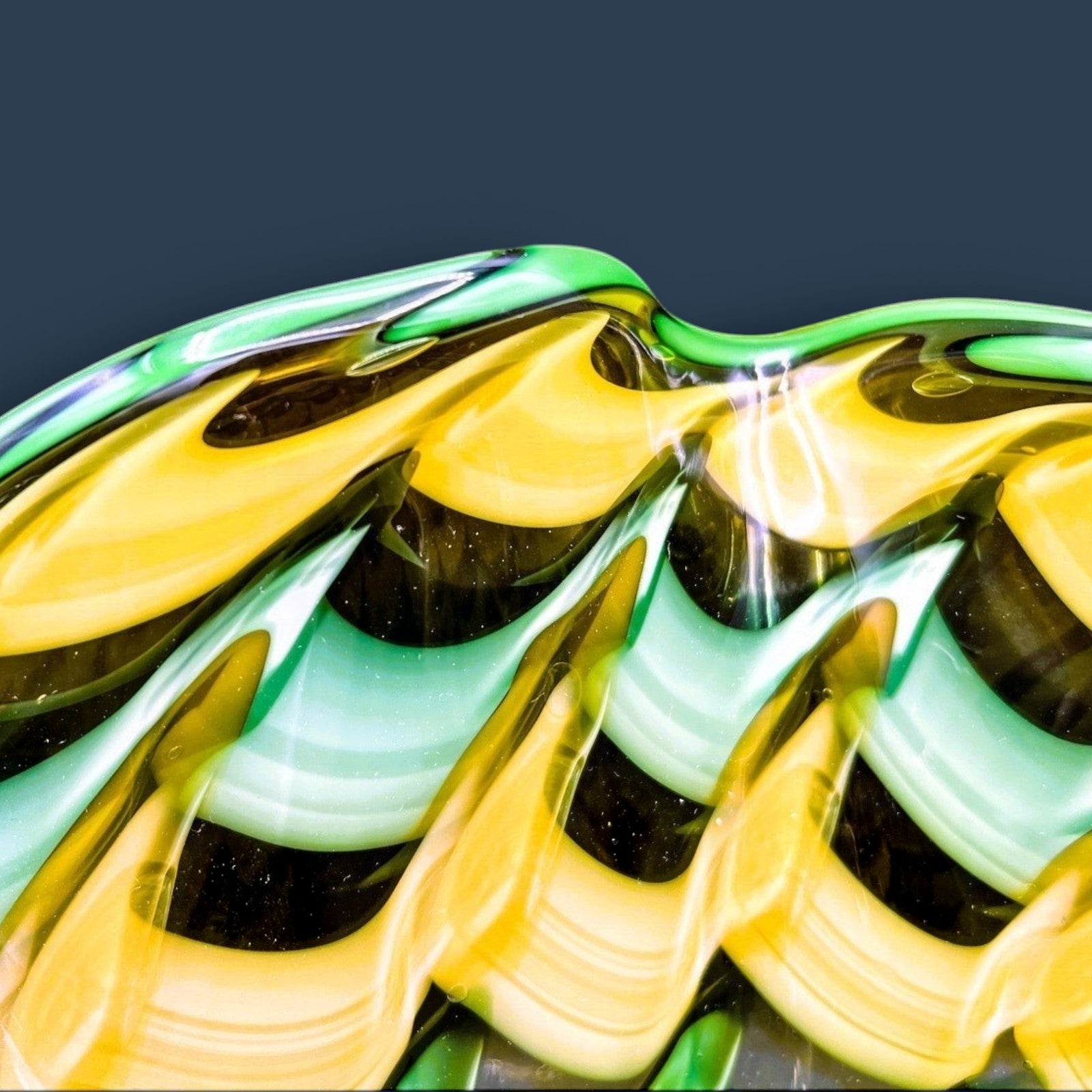 Patina & Prose handblown glass bowl with yellow and green ribbon design, handkerchief shape, midcentury style.