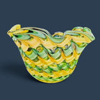 Patina & Prose handblown glass bowl with yellow and green ribbon design, handkerchief shape, midcentury style.