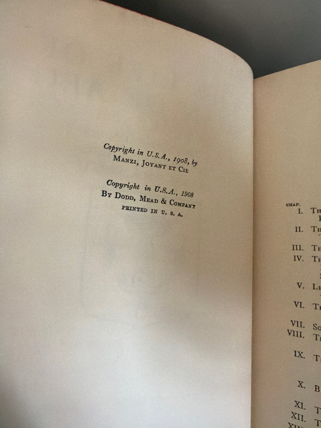 Patina & Prose: 1925 two-volume set of The Life of Joan of Arc by Anatole France, bound in crimson cloth with gold-stamped spines.