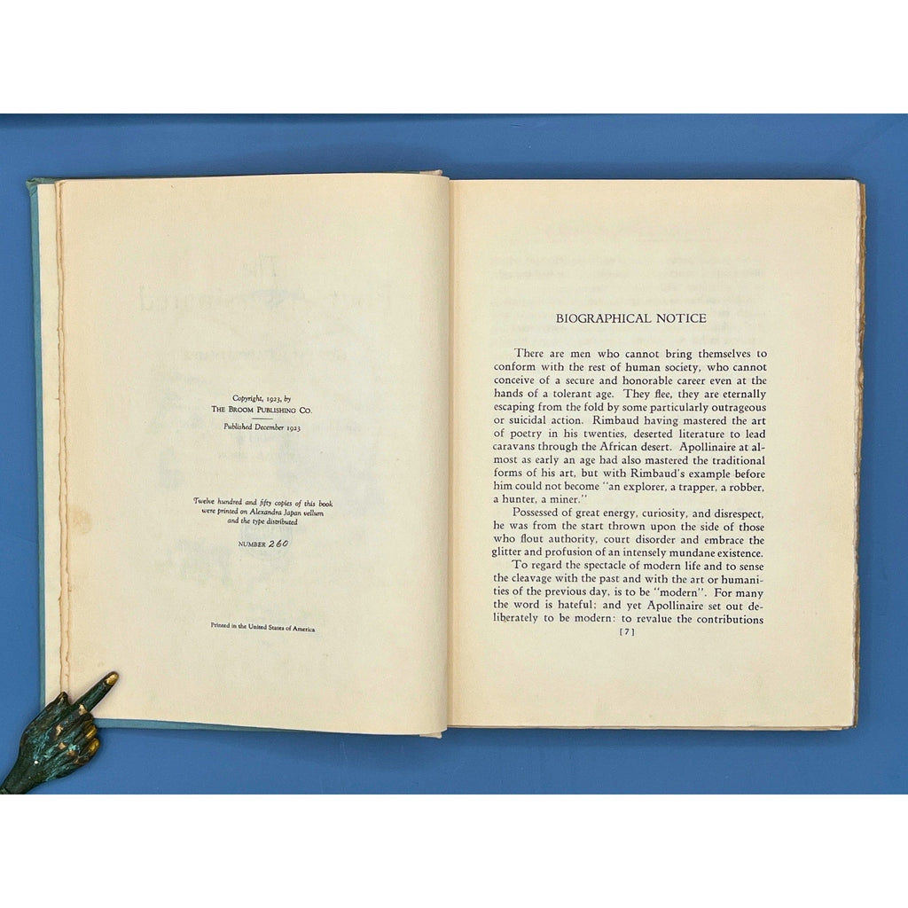 An open 1923 limited edition book displaying the title page of The Poet Assassinated by Guillaume Apollinaire and an opposing line-drawing portrait illustration of Second Lieutenant Guillaume Apollinaire. - Photo 5