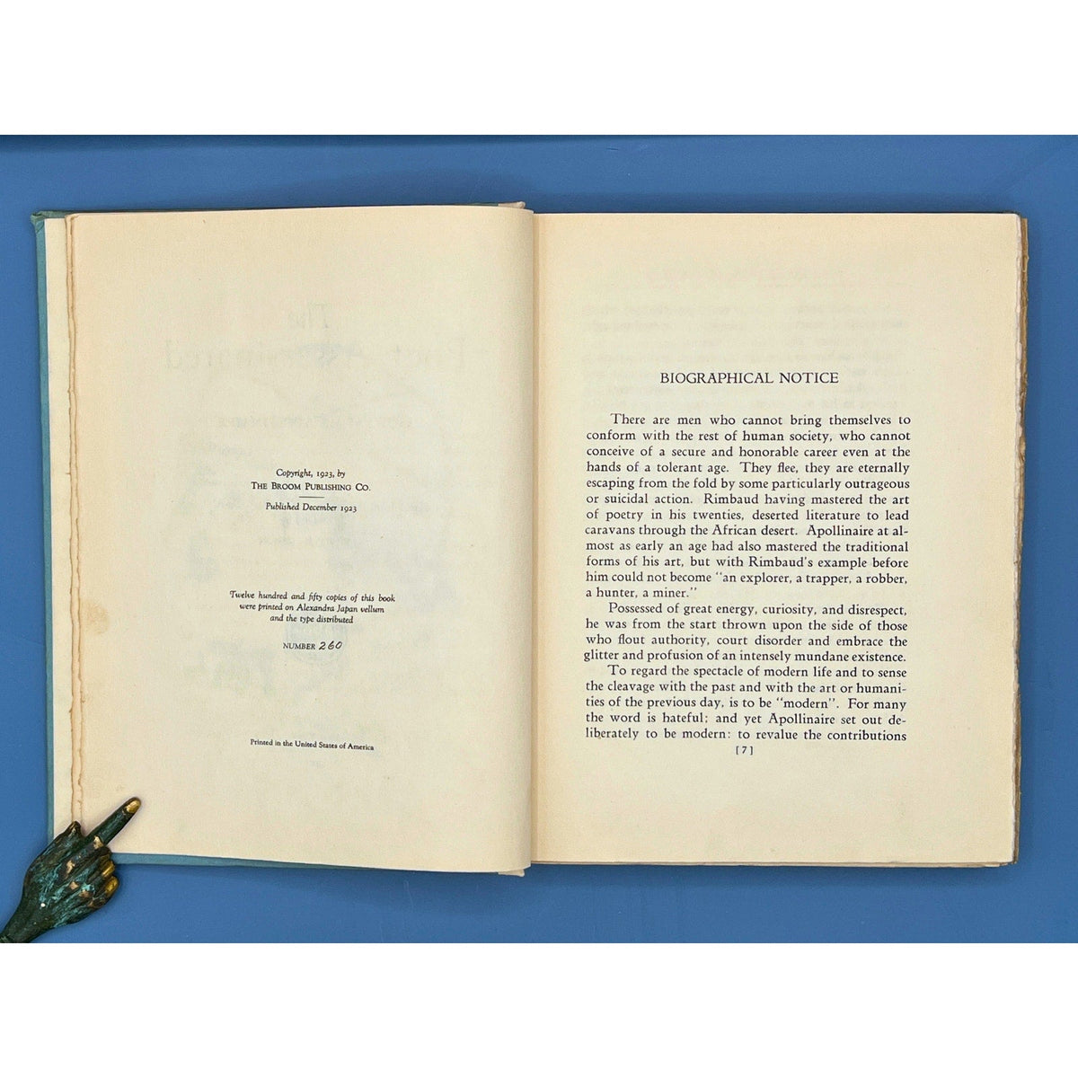 An open 1923 limited edition book displaying the title page of The Poet Assassinated by Guillaume Apollinaire and an opposing line-drawing portrait illustration of Second Lieutenant Guillaume Apollinaire. - Photo 5