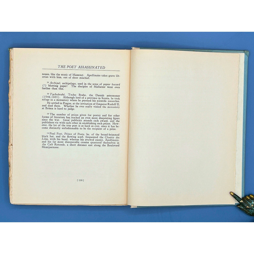 An open 1923 limited edition book displaying the title page of The Poet Assassinated by Guillaume Apollinaire and an opposing line-drawing portrait illustration of Second Lieutenant Guillaume Apollinaire. - Photo 6