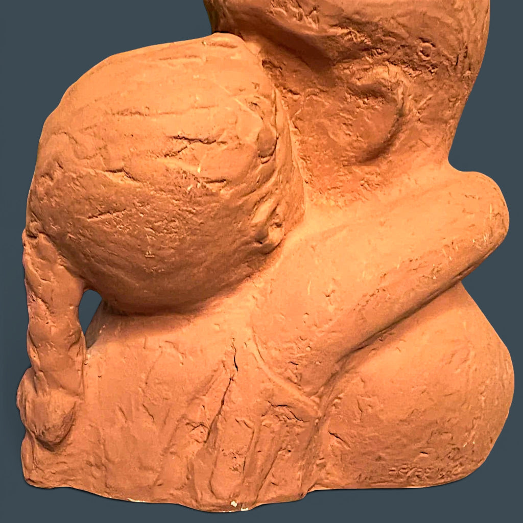 Terracotta clay sculpture depicting two stylized human figures held in a warm close embrace with a hand-modeled rough tactile surface. - Photo 5