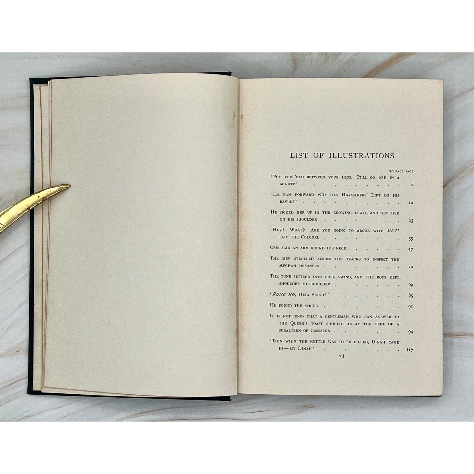 Antique Rudyard Kipling Soldier Stories (1897) hardcover opened to the list of illustrations.