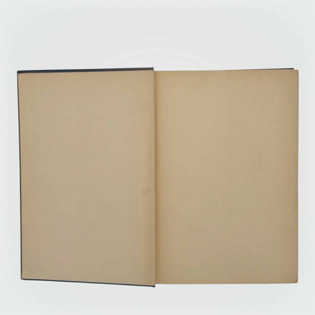 Open hardcover volume of The Diamond Lens and Other Stories displaying the printed colophon leaf set in Estienne type on cream paper with dark blue cloth covers. - Photo 2