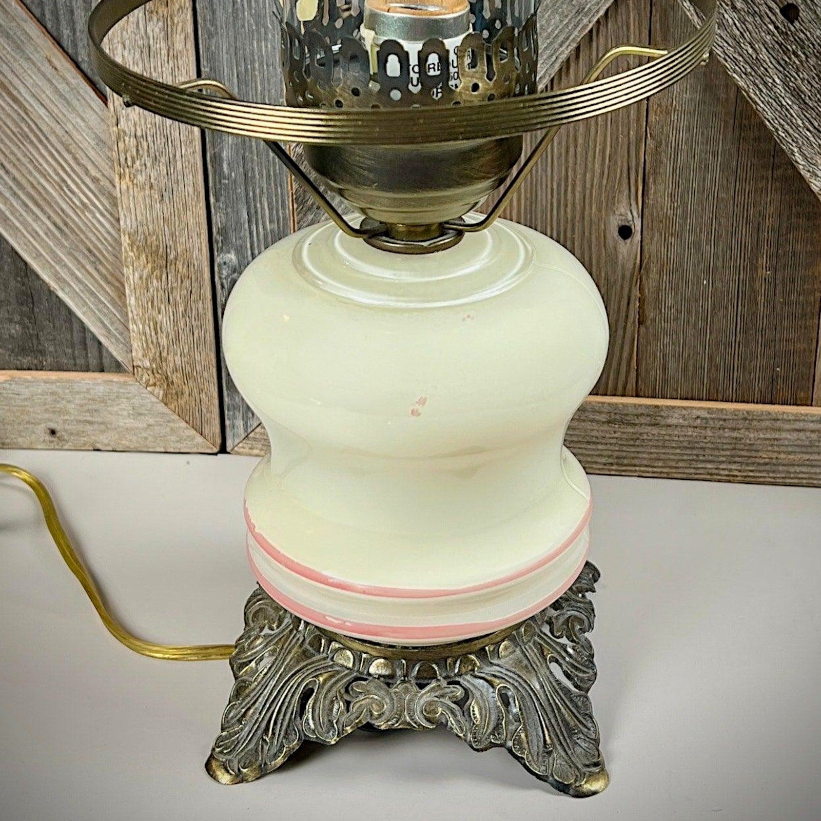 A vintage milk glass hurricane parlor lamp base with hand-painted pink stripes and a highly detailed, ornate brass-finish cast metal footed base. - Photo 7
