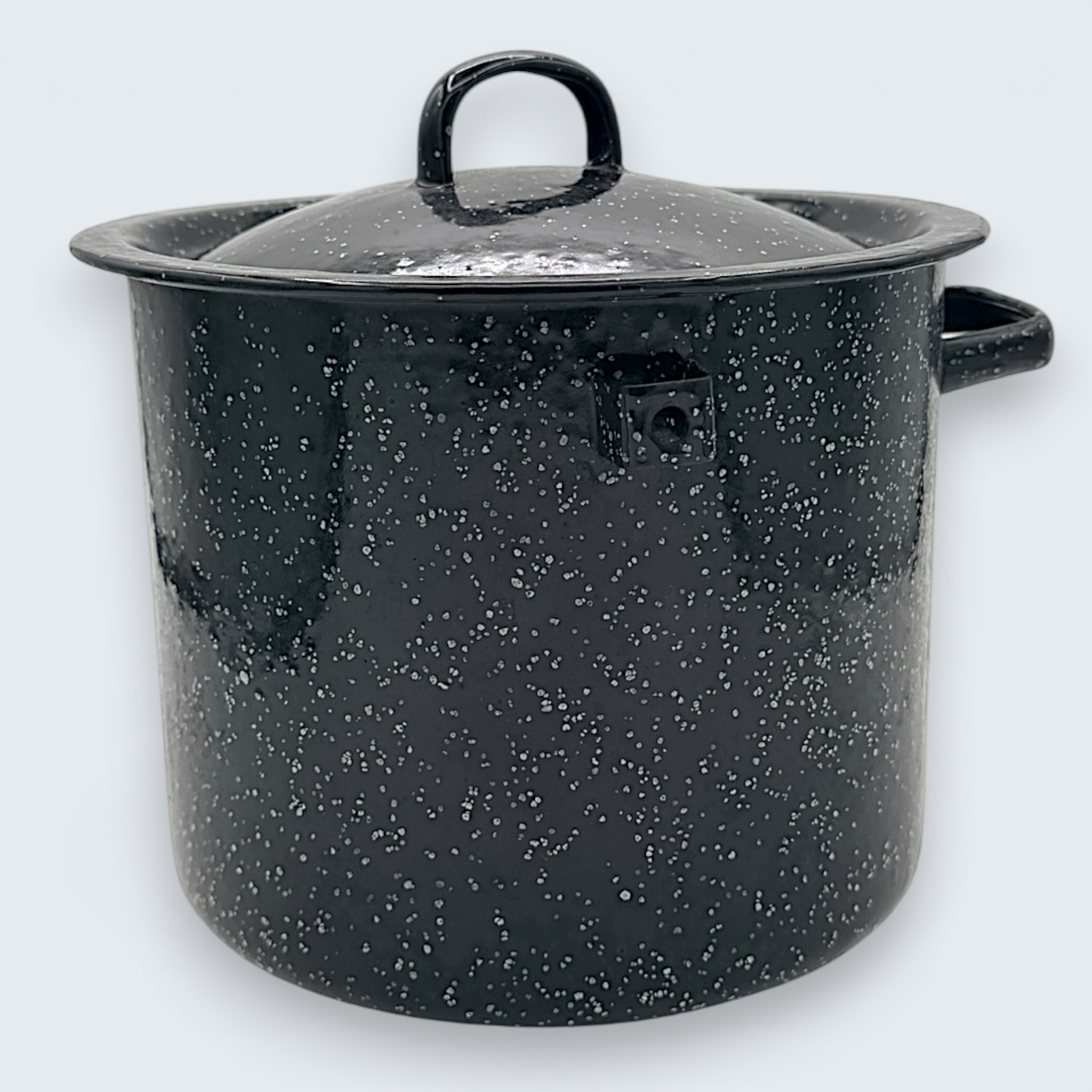 A vintage black speckled enamelware stock pot with a matching lid, featuring a classic white spatter pattern over a glossy black finish and sturdy handles. - Photo 7