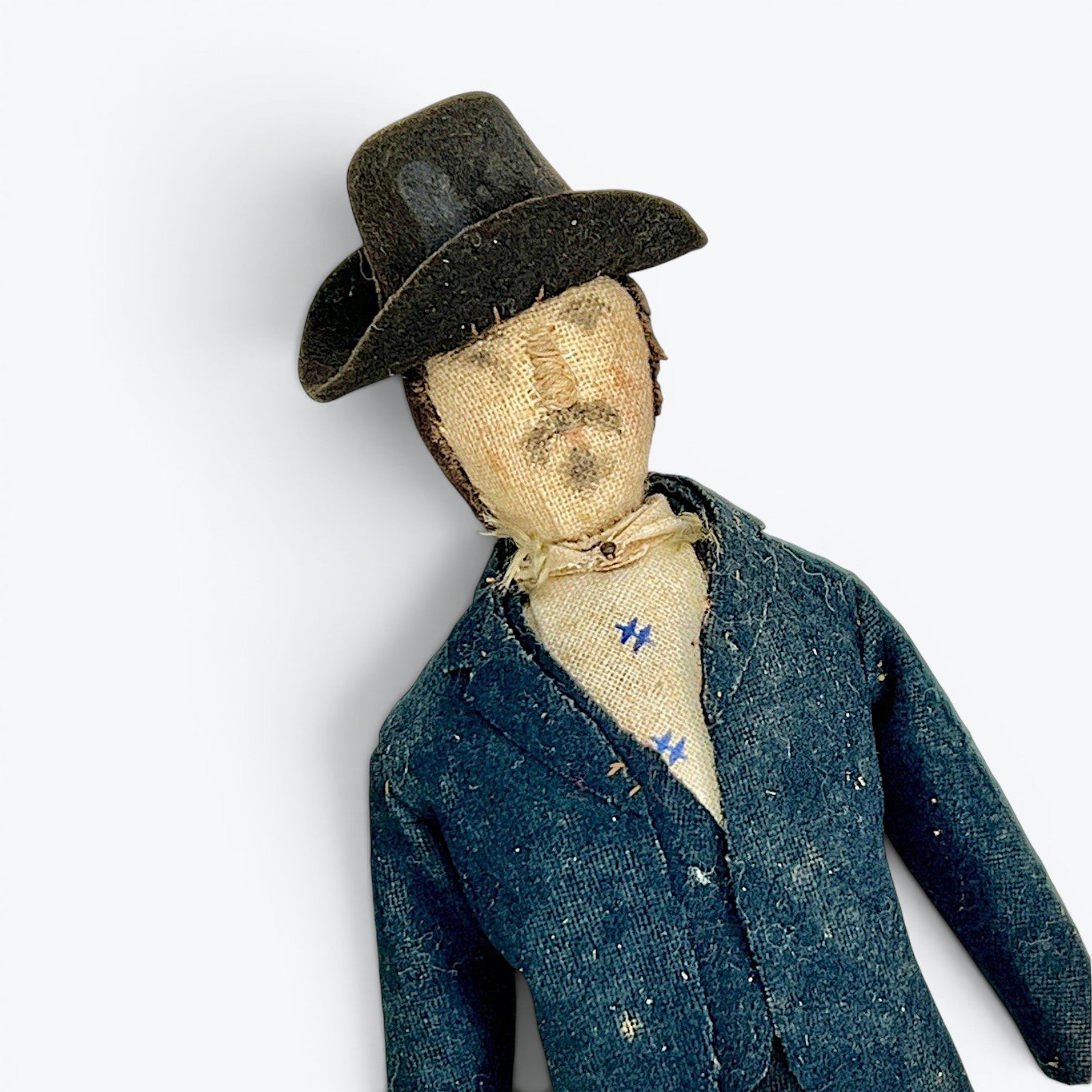 A vintage German miniature bendable dollhouse doll depicting a man in a traditional black suit and wide-brimmed black hat. - Photo 2