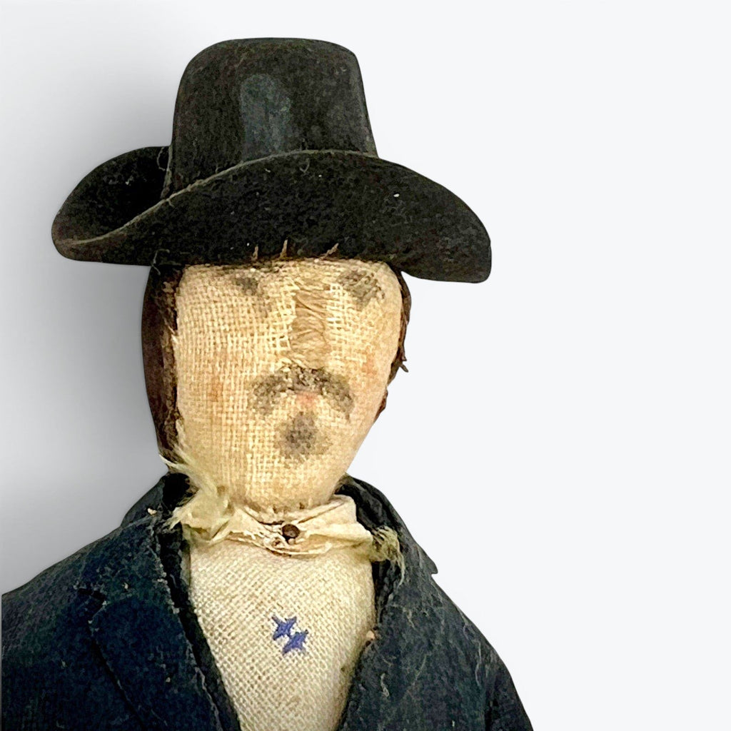 A vintage German miniature bendable dollhouse doll depicting a man in a traditional black suit and wide-brimmed black hat. - Photo 4