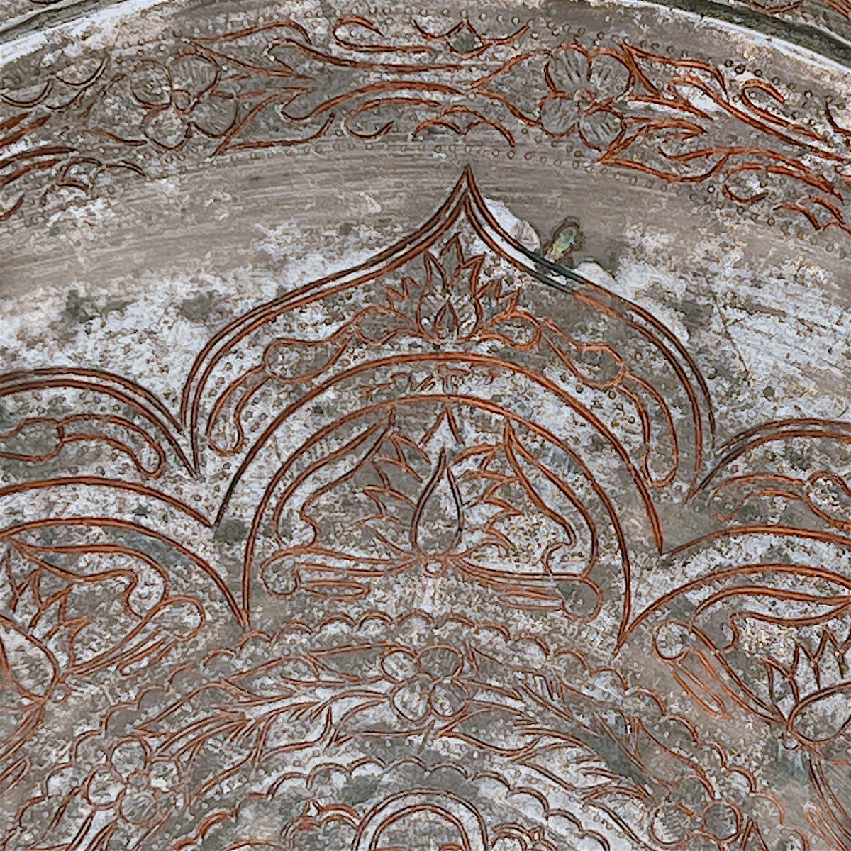 An octagonal tinned copper tray featuring intricate hand-chased Persian floral scrollwork, an elaborate eight-pointed star medallion, and a scalloped rim. - Photo 5