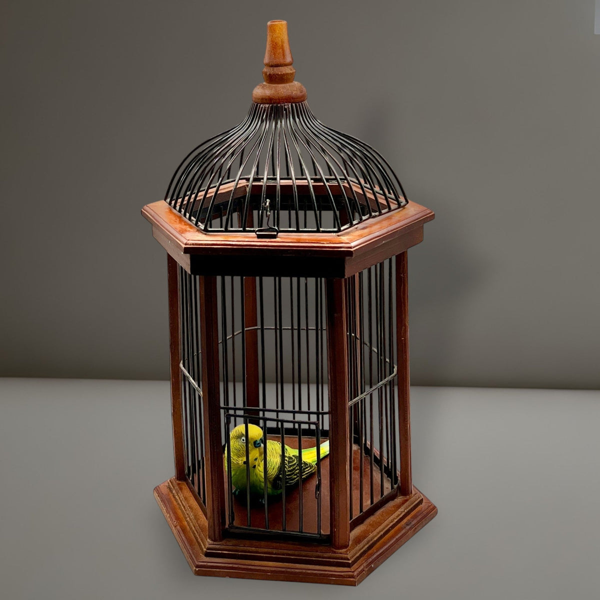 Hexagonal wood and wire decorative birdcage with a dark wooden frame, thin vertical metal bars, and a hinged wire top lid held open. - Photo 3