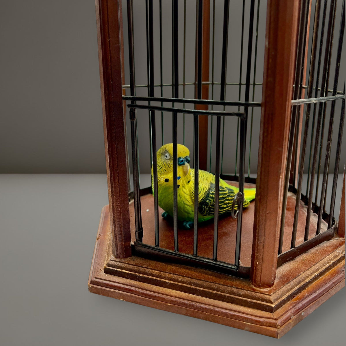Hexagonal wood and wire decorative birdcage with a dark wooden frame, thin vertical metal bars, and a hinged wire top lid held open. - Photo 4
