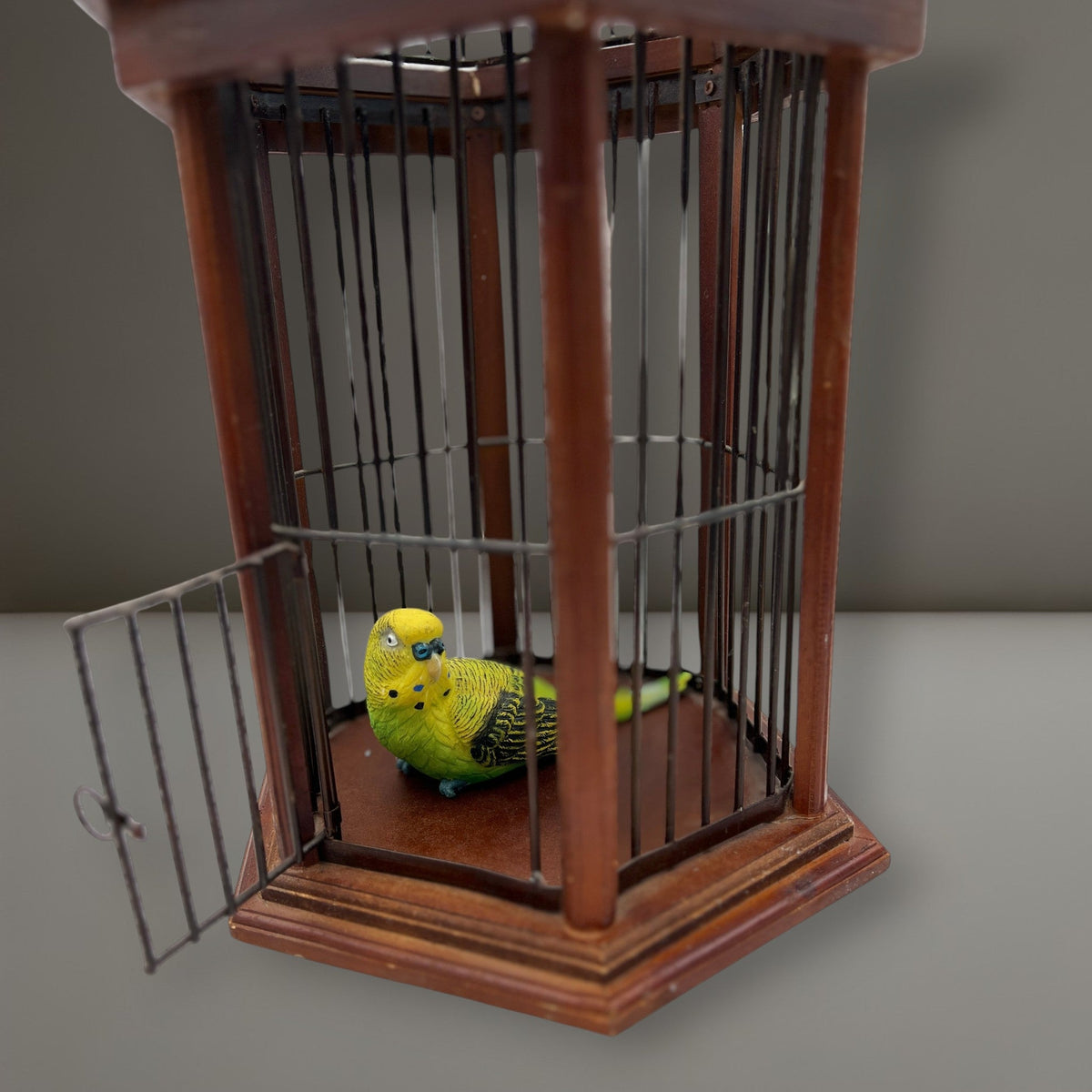 Hexagonal wood and wire decorative birdcage with a dark wooden frame, thin vertical metal bars, and a hinged wire top lid held open. - Photo 5