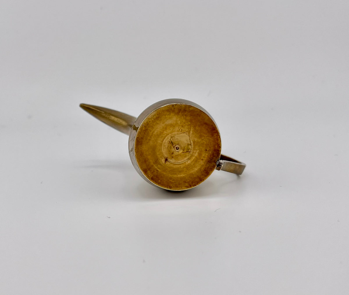 A miniature vintage brass dallah coffee pot featuring hand-chased floral engravings, an elongated curved spout, a rounded body, a side handle, and a hinged conical lid. - Photo 5