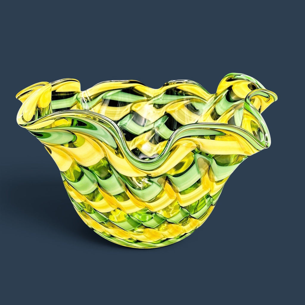 A hand-blown Murano glass handkerchief vase displaying spiraling vertical ribbons of emerald green, canary yellow, and white latticino filigree. - Photo 1