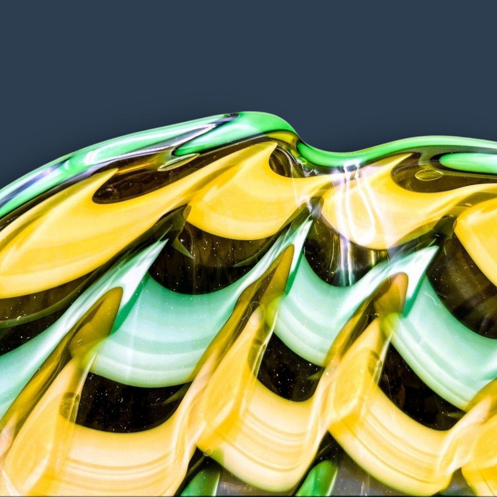 A hand-blown Murano glass handkerchief vase displaying spiraling vertical ribbons of emerald green, canary yellow, and white latticino filigree. - Photo 6