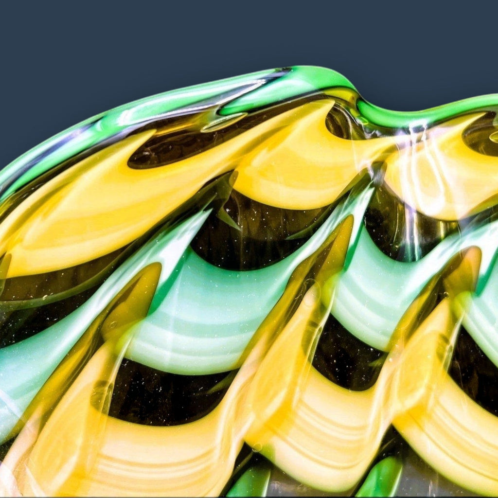 A hand-blown Murano glass handkerchief vase displaying spiraling vertical ribbons of emerald green, canary yellow, and white latticino filigree. - Photo 8