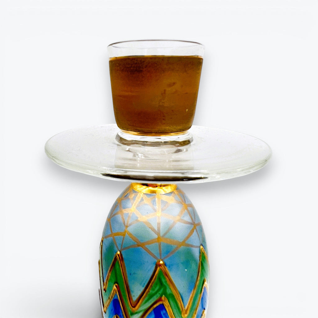 Hand-painted glass candlestick by Paul Nagel featuring cobalt blue and emerald green chevron patterns accented by metallic gold grids on a frosted body. - Photo 4