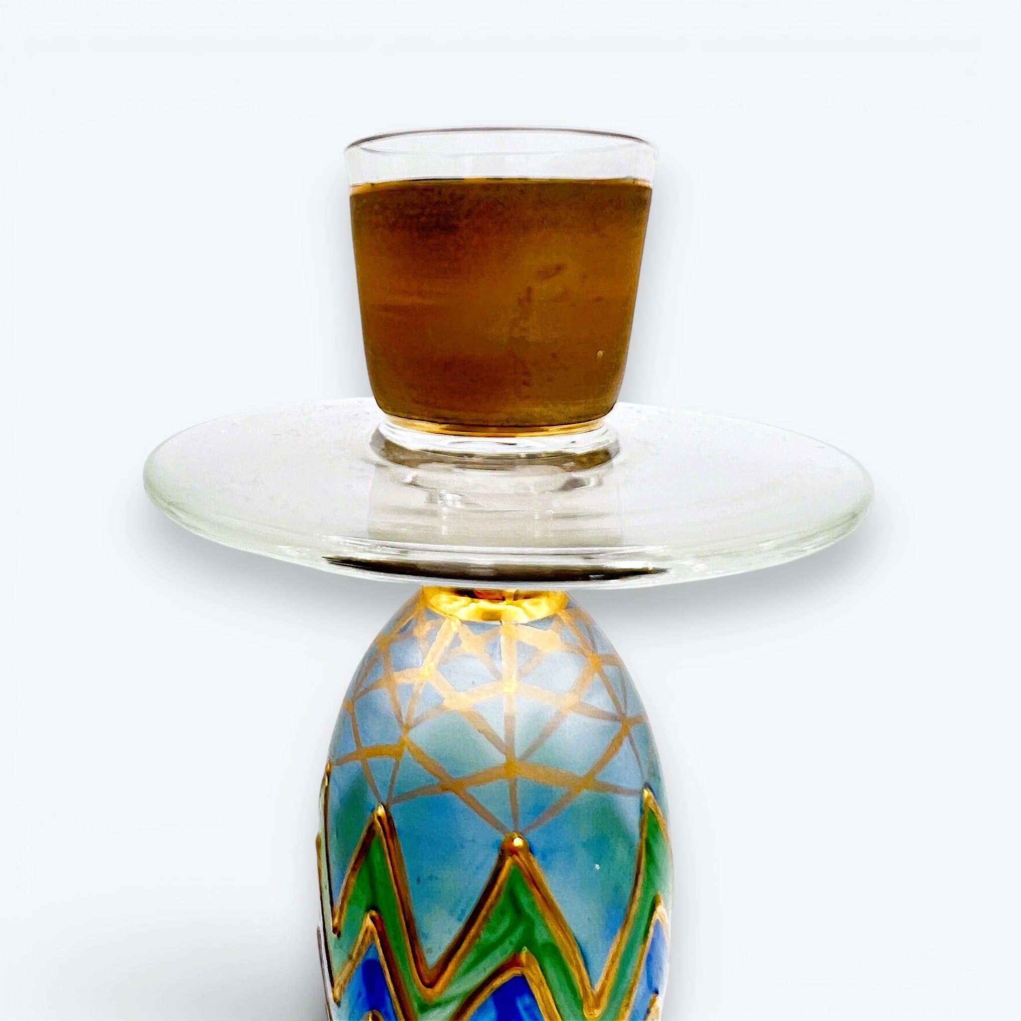 Hand-painted glass candlestick by Paul Nagel featuring cobalt blue and emerald green chevron patterns accented by metallic gold grids on a frosted body. - Photo 4