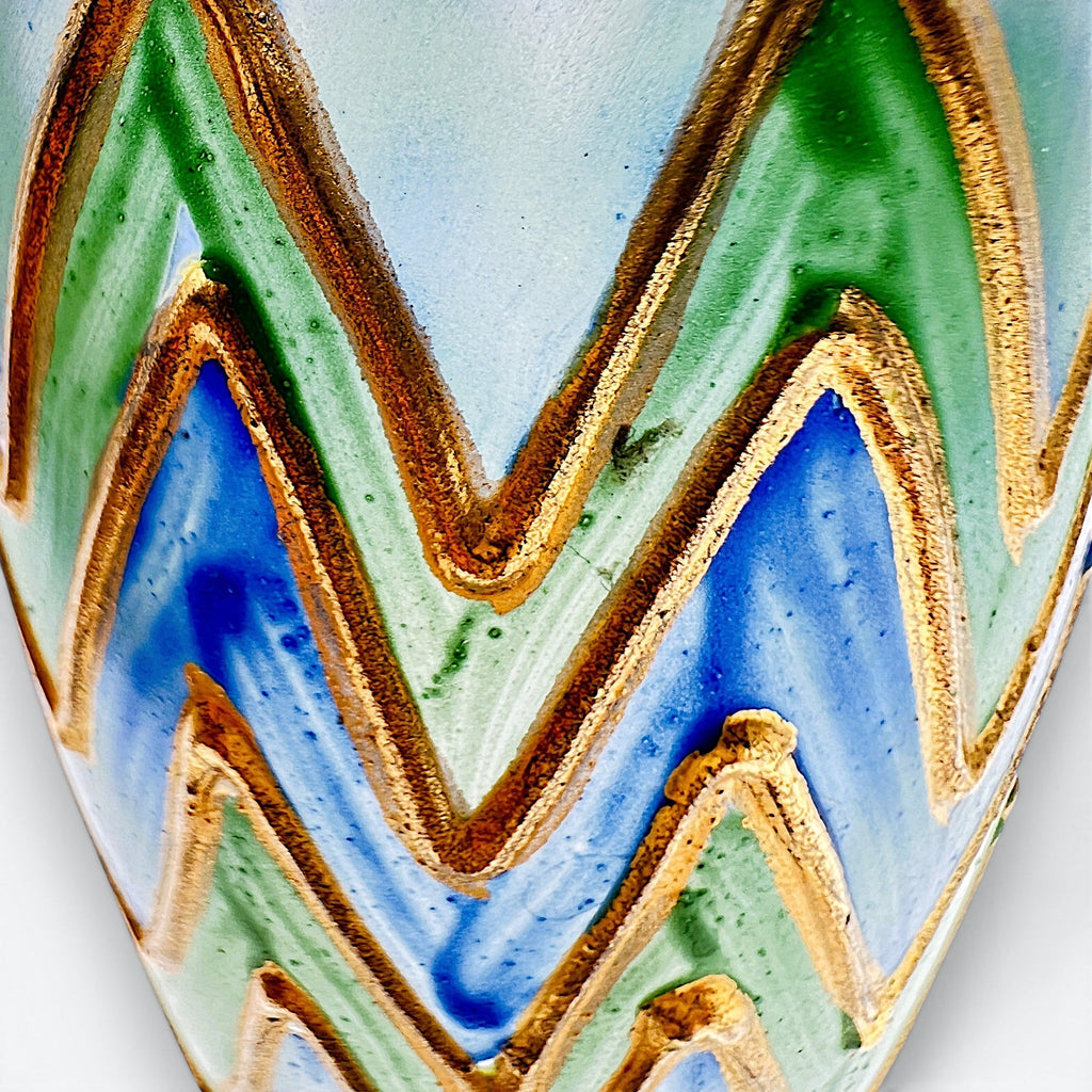 Hand-painted glass candlestick by Paul Nagel featuring cobalt blue and emerald green chevron patterns accented by metallic gold grids on a frosted body. - Photo 5
