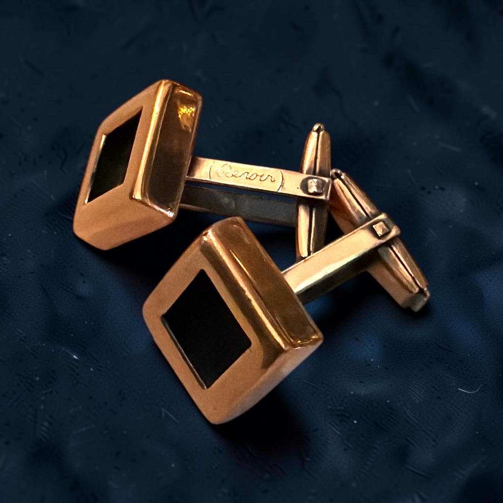 A pair of vintage Mid-Century Modern copper cufflinks featuring clean square faces with recessed black geometric centers and swivel bar toggles. - Photo 2