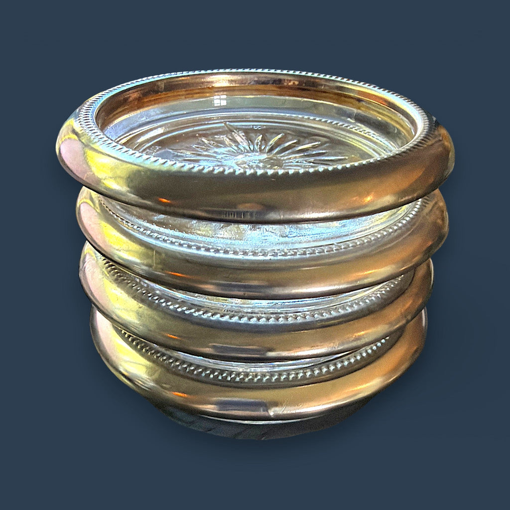 Set of four stacked vintage glass coasters with polished silverplated beaded rims and a clear starburst patterned center. - Photo 6