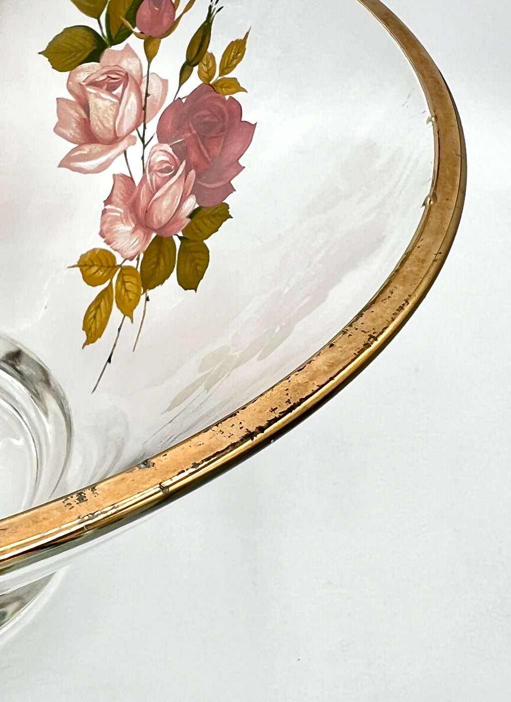 A pair of clear glass cruets with stoppers, featuring hand-painted pink and red roses with green leaves and a gold-gilded band around the neck. - Photo 4