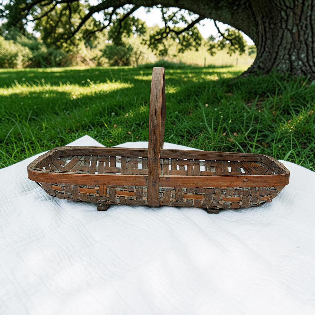 Shallow rectangular vintage wood splint gathering basket with an arched bentwood handle and open weave base resting on a white surface. - Photo 4