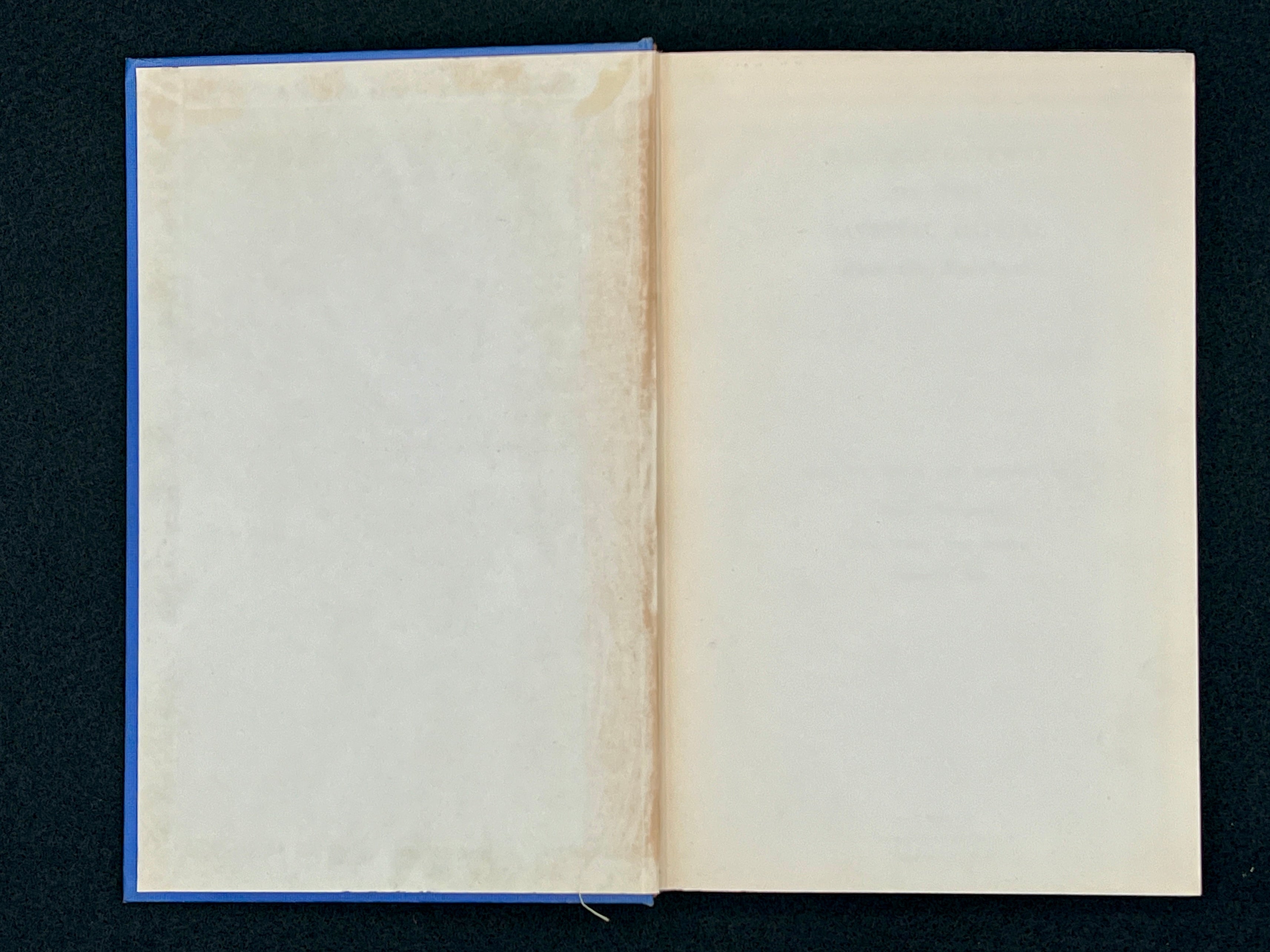 A light blue vintage paper cover of a mid-century Montgomery County Maryland historical publication resting flat on a dark background. - Photo 3