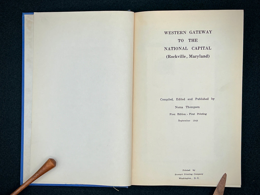 A light blue vintage paper cover of a mid-century Montgomery County Maryland historical publication resting flat on a dark background. - Photo 4