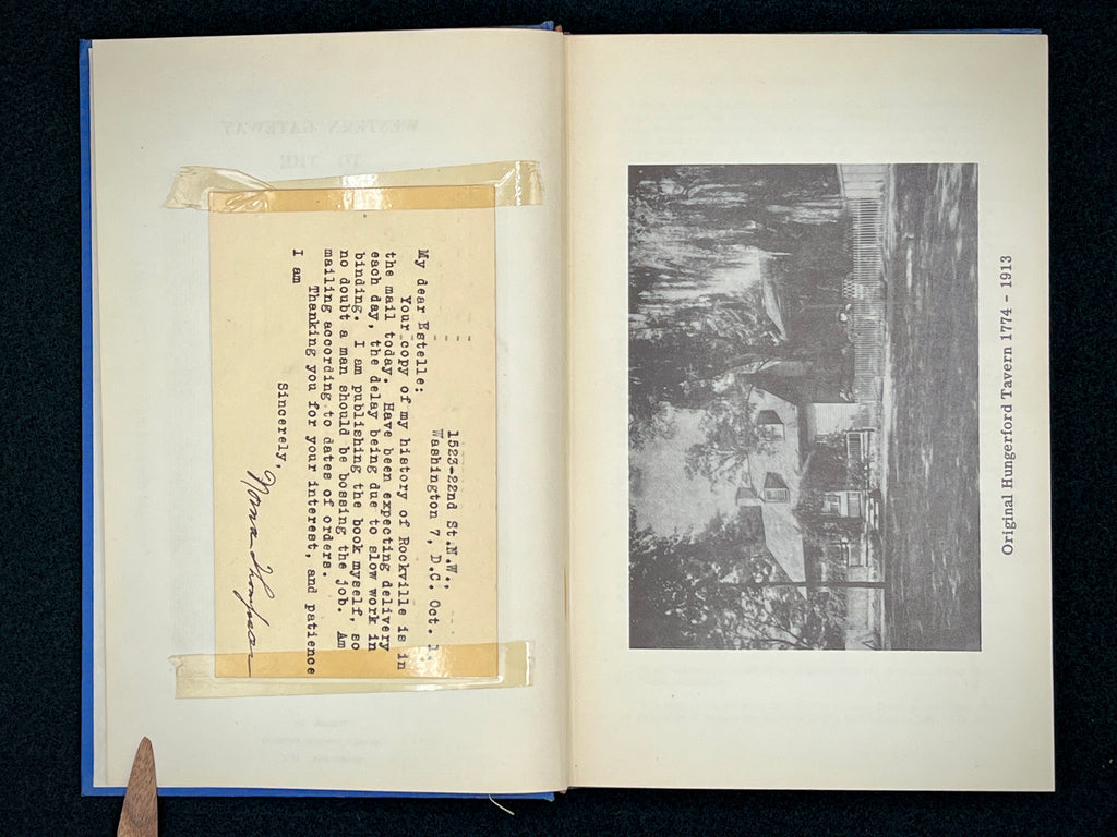 A light blue vintage paper cover of a mid-century Montgomery County Maryland historical publication resting flat on a dark background. - Photo 5