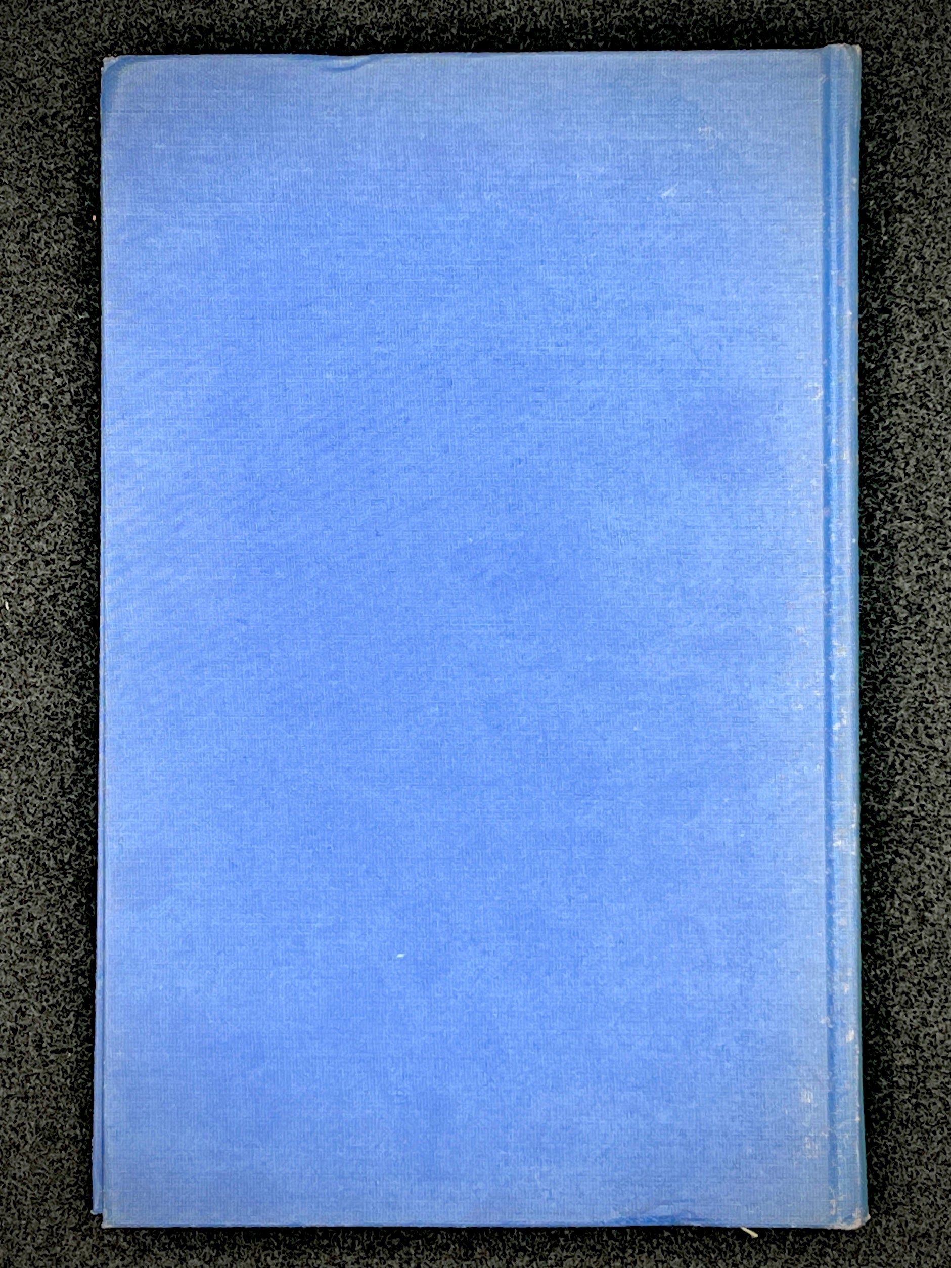 A light blue vintage paper cover of a mid-century Montgomery County Maryland historical publication resting flat on a dark background. - Photo 10