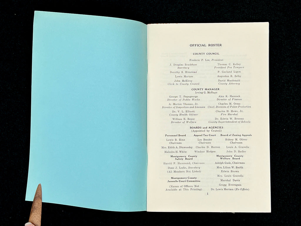 A light blue vintage paper cover of a mid-century Montgomery County Maryland historical publication resting flat on a dark background. - Photo 14