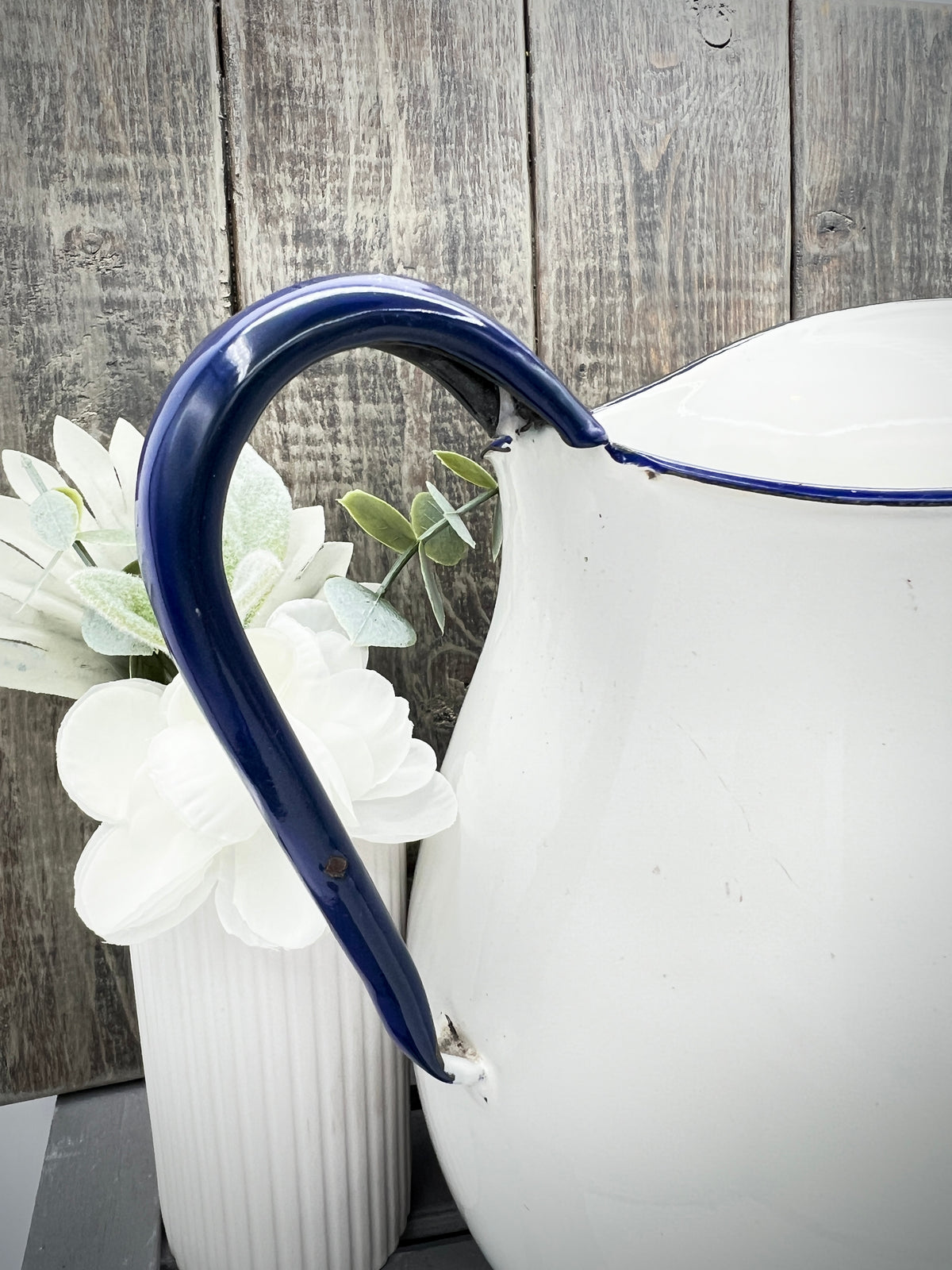 White Enamelware Pitcher w/ Blue Handle